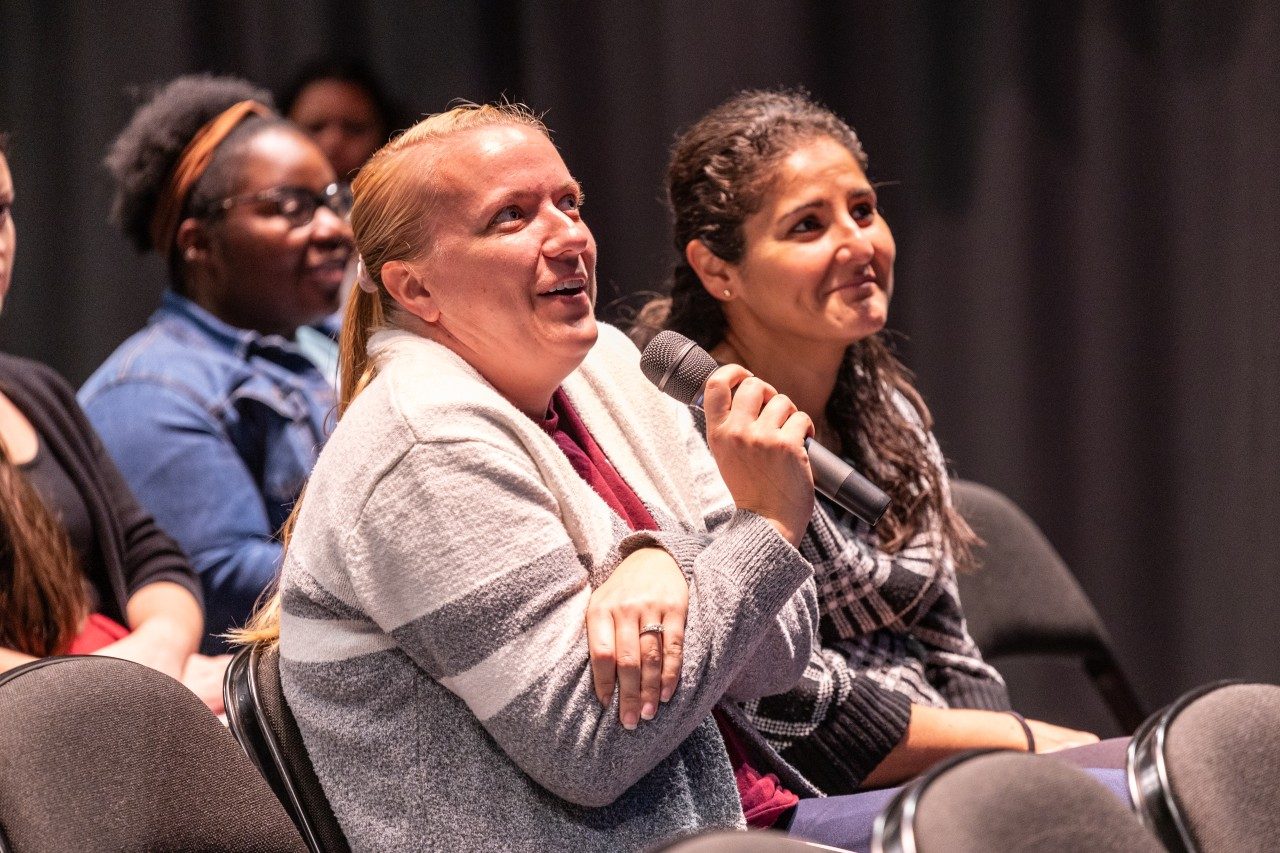 Attendee participates in discussions at 2024 NDEAM event