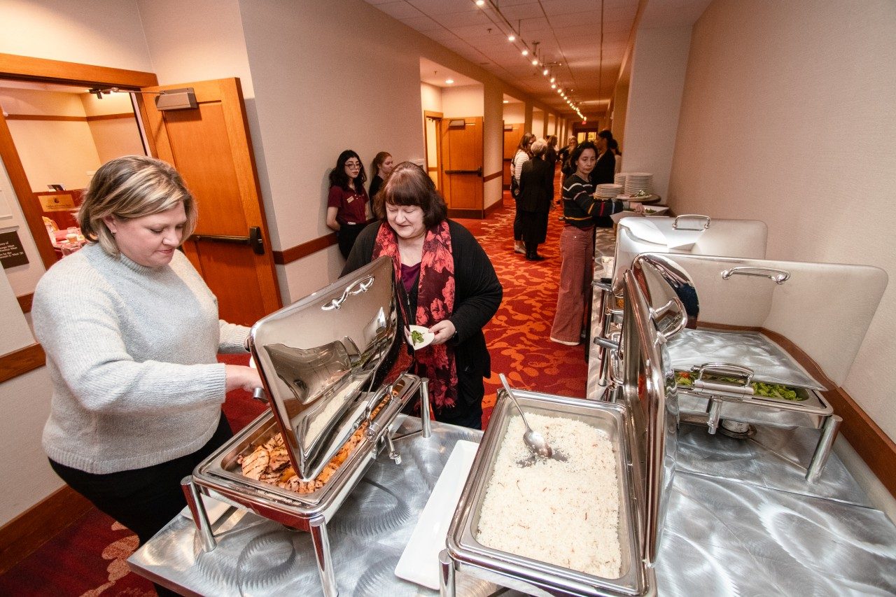 Attendees enjoy a complimentary lunch at 2023 NDEAM event.